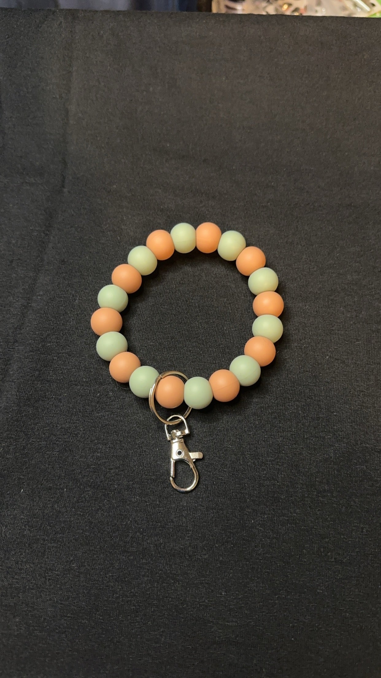 Peach, sage key wristlet