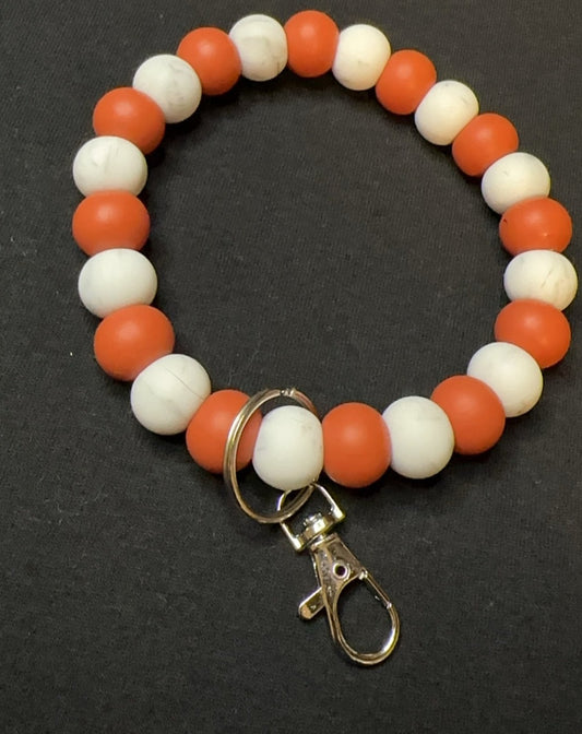 Burnt orange, white marble key wristlet